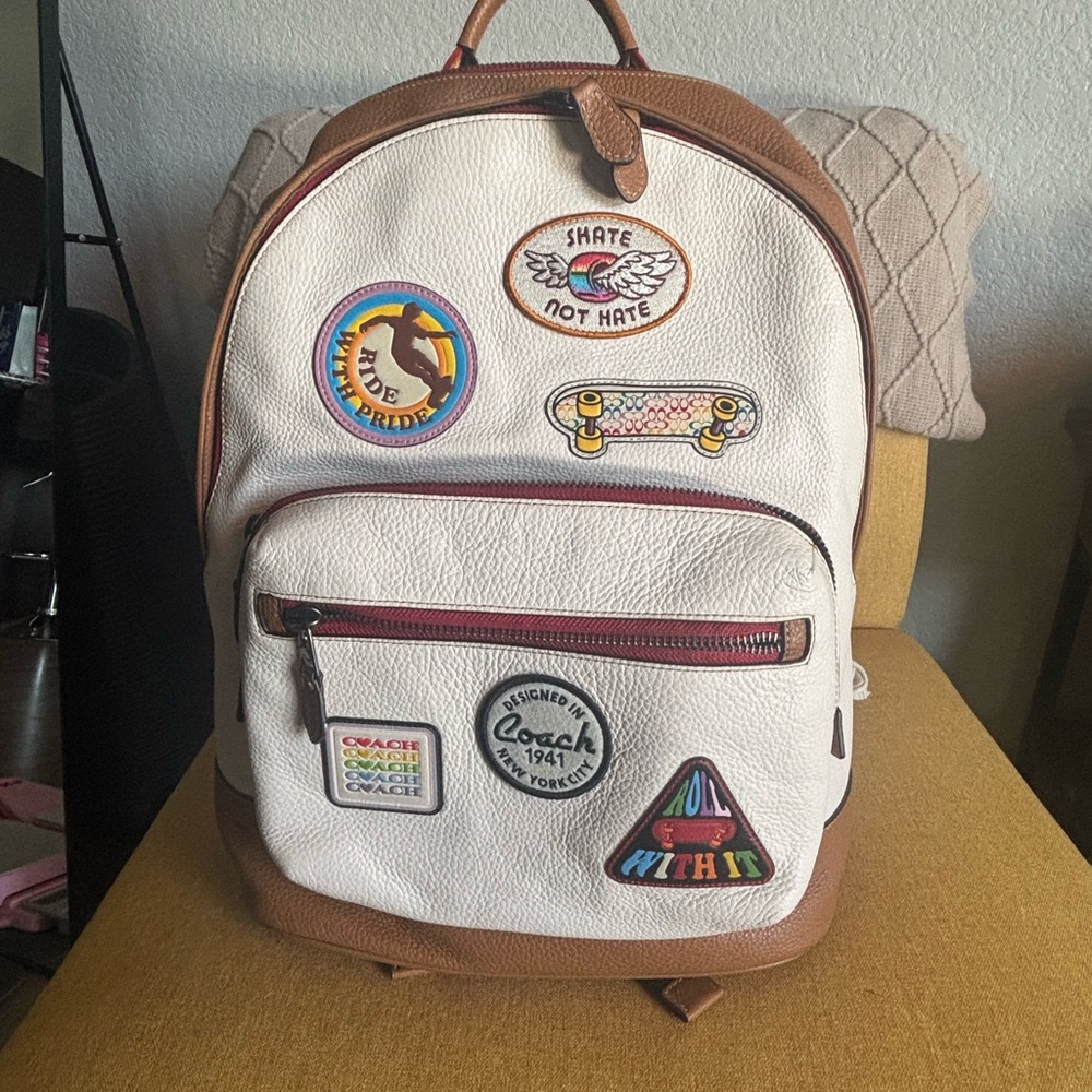 Coach White Leather Backpack with Tan Trim and Colorful Patch Accents